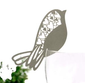 Taupe bird-shaped laser cut wine glass cards with heart pattern for wedding decor