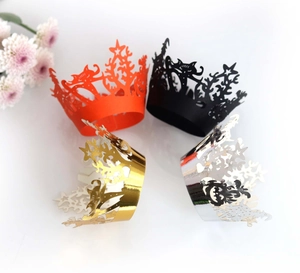 Laser-cut Halloween cupcake wrappers featuring black cats and stars in four metallic colors