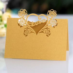 Detailed laser-cut golden rose and heart Love seat card with pearl paper texture