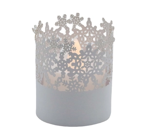 Detailed laser-cut snowflake hollow pattern on white LED candle holder for Christmas decor