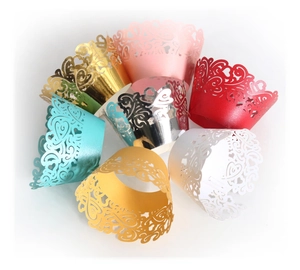 Laser-cut cupcake wrappers with heart patterns in various metallic pearlescent colors