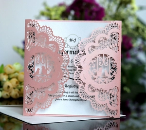 Detailed laser cut lace wedding invitation with birds pattern and glitter pink finish