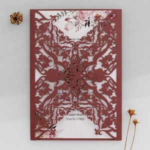 Detailed laser-cut burgundy hollow wedding invitation with floral printed card