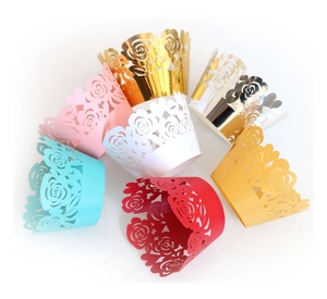 Laser-cut rose pattern cupcake wrappers in assorted metallic and pearlized colors