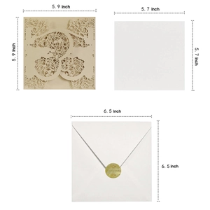 Detailed view of champagne gold laser-cut wedding invitation set with dimensions