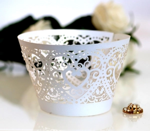 Intricate laser-cut heart pattern cupcake wrapper for wedding and party decorations