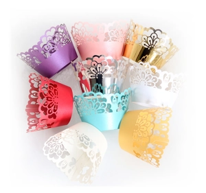 Laser cut lace cupcake wrappers in various colors including purple and lake blue