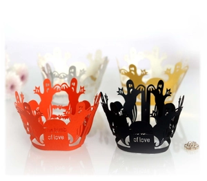 Laser cut Halloween cupcake wrappers featuring spooky ghosts and bat patterns in four colors