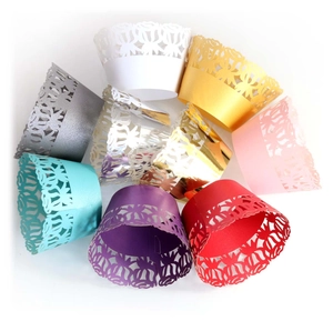 Detailed laser cut rose patterns on multi-color cupcake wrappers for cake decoration