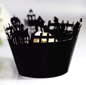 Laser-cut Halloween cupcake wrapper featuring gothic castle and pumpkin patterns