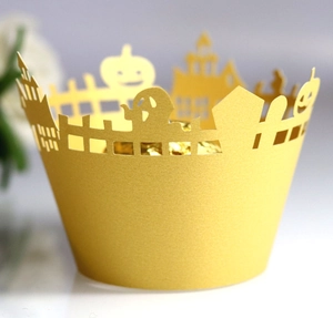 Detailed laser-cut gold Halloween cupcake wrappers with pumpkin and castle patterns