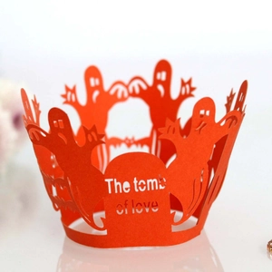 Red laser-cut Halloween cupcake wrapper featuring hollow ghost and tombstone designs