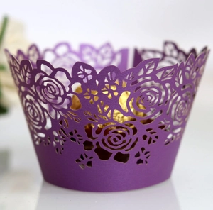 Purple laser cut rose cupcake wrappers with intricate floral hollow design for party décor