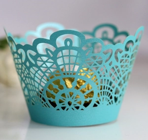 Laser-cut Tiffany blue lace cupcake wrapper with intricate patterns for dessert decoration