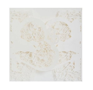 Detailed laser-cut vine patterns with heart-shaped birds on cream wedding invitation