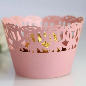 Dusty pink laser cut cupcake wrappers with rose flower pattern for wedding decoration