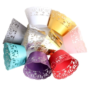 Laser cut rose hollow cupcake wrappers in multiple vibrant colors for wedding decorations