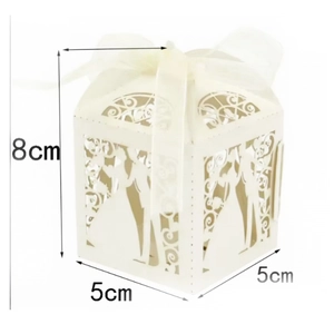 Detail view of cream laser-cut wedding favor box with dimensions 5x5x8cm and ribbon bow
