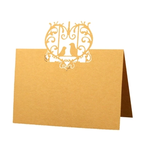Laser cut butterfly and bird kraft paper wedding place cards with hollow design