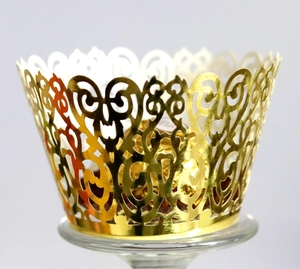 Laser cut mirror gold cupcake wrappers with elegant European filigree patterns for weddings