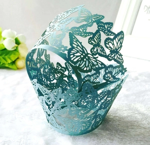 Detailed laser-cut butterfly hollow cupcake wrappers in elegant tiffany blue paper