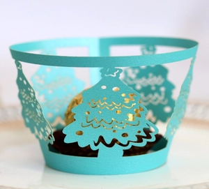 Laser cut Tiffany Blue paper cupcake liner with Christmas tree hollow design