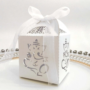 White laser cut Ganesha favor box with organza ribbon for weddings and candy packing