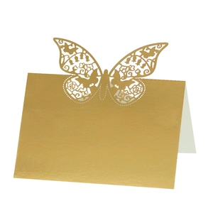 Detailed laser-cut gold butterfly place card with metallic texture for wedding tables
