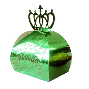 Detail of laser-cut floral pattern and crown top on green metallic wedding favor box