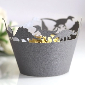 Laser cut dinosaur cupcake wrappers in dark gray for children's holiday party dessert decor
