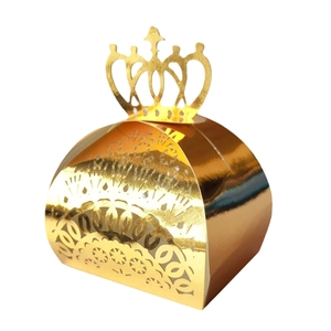 Laser-cut gold crown favor box with hollow patterns for weddings and festive parties