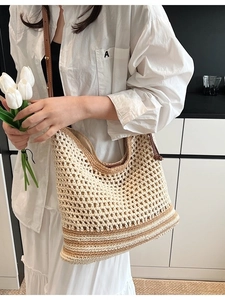 Chic hollow-out woven tote bag in cream and brown with slim leather straps