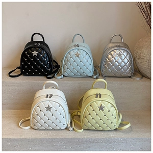 Quilted mini backpacks in five colors featuring star rivets and diamond patterns