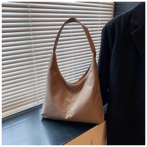 Chic beige half-moon hobo bag in pleated canvas style for daily office commute