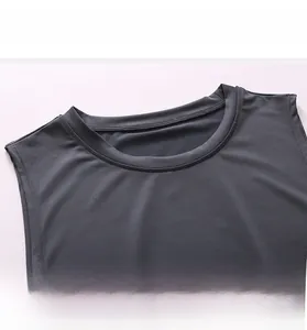 Detail view of reinforced crew neck stitching on dark gray athletic tank top for men