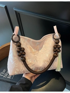 Sac cabas rose à jacquard papillon avec poignées en perles de bois et gland