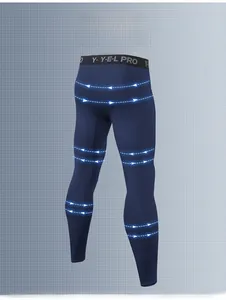 Detail of high-stretch compression fabric and breathable waistband on blue sports pants