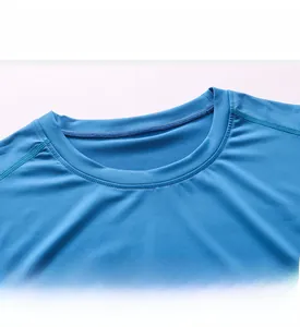 Detailed close-up of the royal blue crew neck and stitching on the men's athletic vest