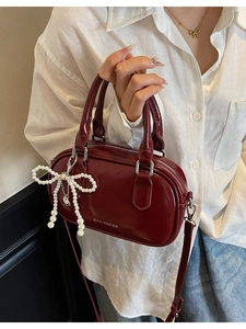 Vintage wine red oil wax leather Boston handbag with pearl bow charm and shoulder strap