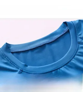 Close-up of the reinforced crew neck and stitching on blue men's compression fitness shirt