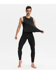 Detail showing the high elasticity and stretch of the black men's compression fitness vest