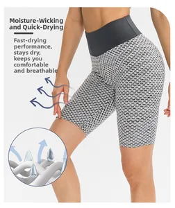 Detail of high-waisted honeycomb yoga shorts featuring moisture-wicking and breathable fabric