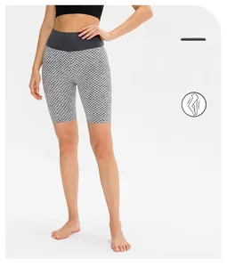 Detail showing high-waist yoga shorts with 3D honeycomb texture for belly control