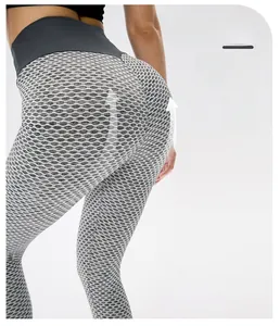 Detailed view of honeycomb textured fabric on high-waist scrunch butt lifting yoga pants
