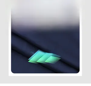 Close-up of dark blue breathable compression fabric with moisture-wicking texture