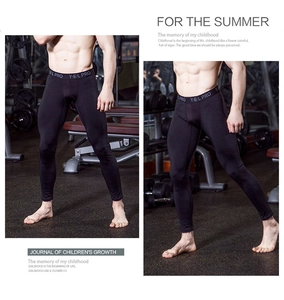 Men's compression pants with high-elastic fabric and supportive waistband logo detail