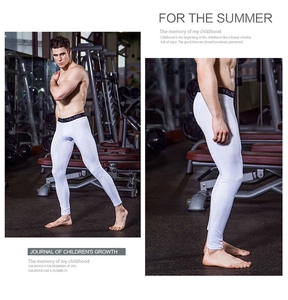 Macro detail of men's white compression pants with branded elastic waist for gym training