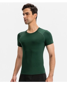 Detail of high-elasticity quick-dry men's compression shirt in dark green gym fabric
