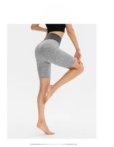Detail showing the honeycomb texture and high-waisted design of the scrunch butt shorts