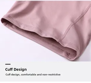 Detail of ribbed cuff design on high-elastic yoga shorts with neat stitching in dusty pink